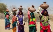 Women of Cheel Bandh village, (From Right to Left) Lachmi, Kareema, Radha, Kanta and Devi Umerkot district, on their way to the well to fetch water for their homes. Photo: Sharjeel Arif / Concern Worldwide