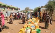 Hundreds of people waiting for a weekly water truck to arrive in Kersa Dula, Somali Region, Ethiopia. The people here get an average of 20 liters of water per person for one week, very far below the UN standards. Photo: Jennifer Nolan/ Concern Worldwide