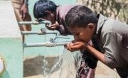 Children from Satla Bheel village enjoy drinking water from the water plant system installed by Concern. Pakistan. Photo: Black Box Sounds/Concern Worldwide