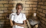 15 year old Liliana Mwenza wa llunga says the new water point and other interventions by the Concern-led WASH consortium in her village, Mulombwa, has had a very positive impact on family life. DRC. Photo: Kieran McConville/ Concern Worldwide