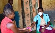 Mary Ambweni, Health Surveillance Assistant, at a heath centre in Lilongwe distributing soap to beneficiaries. 