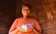 'It will help my household curb the risk of contracting the virus' says Veronica Banda from Lilongwe after receiving soap and Covid-19 fliers as part of a hygiene distribution by Concern Malawi.