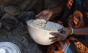 Dukan* is cooking Walwal which is a grain a bit like millet and is cooked with water. Photo: Abbie Trayler-Smith