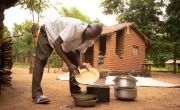 Forty Sakha doing the washing up in Nsanje, Malawi.