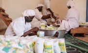 Women from the Afani Yara Women's Group work on the production of baby flour.