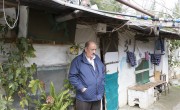 Syrian refugee Ibrahim* stands outside his home at an informal tented settlement in the village of Samounniye, Akkar, north of Lebanon. Photo: Dalia Khamissy/ Concern Worldwide