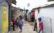 Children play outside homes at an informal tented settlement in the village of Samounniye, Akkar, north of Lebanon. Photo: Dalia Khamissy/ Concern Worldwide