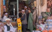 People mingle in the main bazaar in Baraki Rajan, Logar Province. Photo: Stefanie Glinski/Concern Worldwide