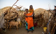 Lowiriyen and daughter Lagu with the family's adopted goat.