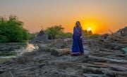 Manu on the spot where her home once stood. It was destroyed in the worst floods that Pakistan has experienced in decades.