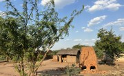 Informal brick housing and a brick oven at Bitilinyu Camp, Ndamera, Malawi. Photo: Lydia Lampiri/Concern Worldwide.