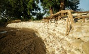 Constructed by the local community, this dyke will help protect this flood-prone area of Mbenje, Malawi. Photo: Jon Hozier-Byrne/Concern Worldwide.