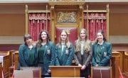 Cross and Passion College's debating team at the 2025 quarter-final at Stormont, Belfast