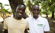 Yussuf Mansaray, VSLA Chair, and Usif Sesay of Concern in Magborkorr, Sierra Leone. Photo: Kieran McConville/Concern Worldwide.