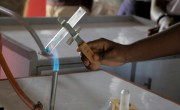 A pupil heats a test tube in a bunsen burner
