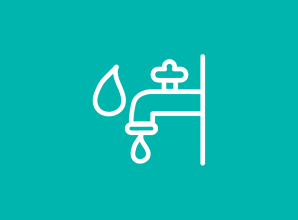 A simple white line illustration of a water tap with droplets of water against a turquoise background. The icon represents access to clean water, safe sanitation, hygiene services, and essential water infrastructure for communities.