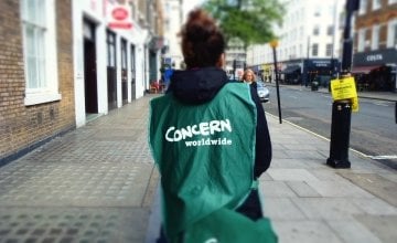 A Concern street fundraiser stands on the pavement near Baker Street. Photo: Lucy Bloxham / Concern Worldwide