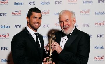 Tom Arnold, pictured with Irish International Rugby Player, Rob Kearney after he received his 2013 People of the Year Award at the 39th Annual People of the Awards Ceremony organised by Rehab held in the CityWest Hotel, Co. Dublin. Photo: Robbie Reynolds.