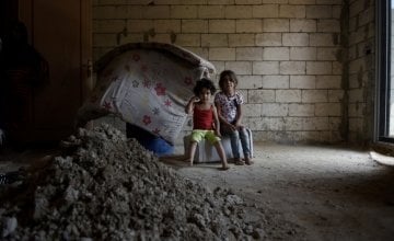 Syrian refugees *Alya, aged 5, and her cousin *Sultan, aged 4, are pictured in the home they share with their family and cousins after being moved by Concern as they were in danger. Photo: Mary Turner