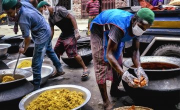 Volunteers of Bidyanondo are packing food supplies to ensure twenty thousand people’s food every day during lockdown in Dhaka, Bangladesh, 2020. Photo: Mohammad Rakibul Hasan / Concern Worldwide.