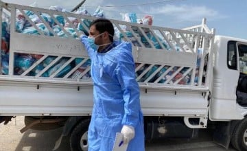 Hygiene kits being distributed at Khankay camp, Iraq