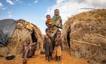 Ng’ikario Ekiru feeds her family with wild desert fruit and roasted animal hides as they experience the second drought in three years. Photo: Gavin Douglas