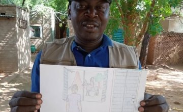 Kouguer, a water quality technician for our WASH studies and projects in Chad, with his drawing.