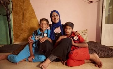 Fatima, here with her children, fled her home in Syria. Photo: Act for Peace