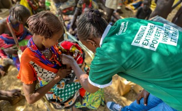 Concern nurse Beatrice welcomes mothers and children at an outreach centre in rural Kenya. Photo: Jennifer Nolan