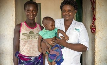 Matron Emielliene Mapouka (39) with six-month-old Rosalia and mum Hortense Mbolidere. Photo: Chris de Bode/Panos for Concern, CAR