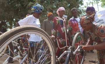 Influential women and traditional healers bicycle maintenance training session. Photo: Musa S Kamara.