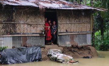A Rohingya family affected by the flooding and landslides. 