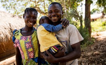 Couple Natalie and George with their one-year-old son Adere in Manono, DRC