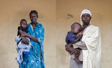 Two South Sudanese women, both 30, holding their young infants