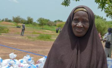 Awa Sawadogo is internally displaced. Here she is receiving a kit at Yargho. Photo: Jean-Paul Ouedraogo/Concern Worldwide