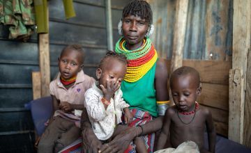 Emergency cash grants from Concern are helping Akiru to buy enough food to keep her three sons Edward (5), Adoudou (3) and Lopoori (18 months), well fed. Photo: Ed Ram/Concern Worldwide