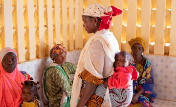 Women who've brought their children for treatment to a local Concern-supported health centre in the Tahoua region