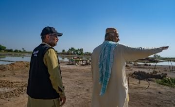 Mohsin Badar assessing the damage to a man's dwelling in the district Jacobabad. Photo: Ingenious Captures/Concern Worldwide