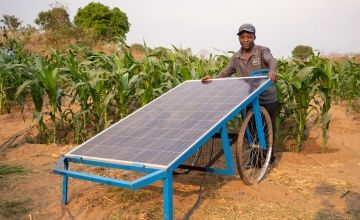 Mcfreson Aaron is a farmer in Mkulira village, Mwanza District. He explains how he uses the solar powered irrigation pump and other climate smart agricultural practices help him and his village. Photo: Chris Gagnon/Concern Worldwide