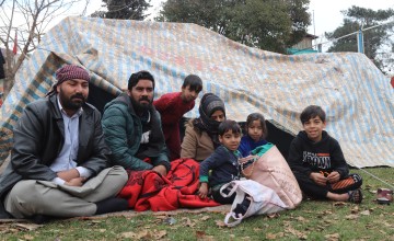 Mahmoud Sabry Al Faris and extended family sharing a tent, where they have been living since the major earthquakes that took place on 6th February. Photo: Enes Elahmaed/Concern Worldwide