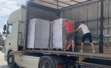 Staff load trucks with food and hygiene kits to send to distribute to flood-affected evacuees. Photo: Concern Worldwide