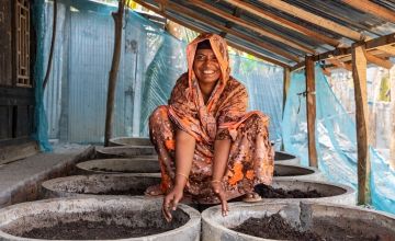 As a lead farmer, Asma has supported 400 households in her area. She is pictured here with her vermicompost. Photo: Gavin Douglas