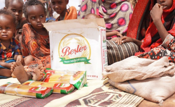 Bishaaro's children with food items purchased as a result of the Concern ERNE monthly cash transfer. Photo: Conor O'Donovan/Concern Worldwide