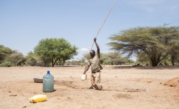 Joseph Ikitela fetches water from a hand-dug well that his community is currently relying on in Northern Kenya’s Moruongor village in Turkana County. Photo: Lisa Murray/Concern Worldwide