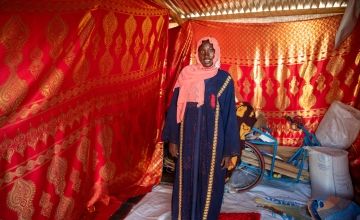 Aichta in her tent in a refugee camp in Chad