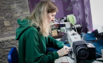 Ukraine woman sewing 