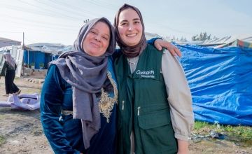 Hatice with Darine*, an earthquake survivor who now lives in a makeshift camp. Photo: Gavin Douglas/Concern Worldwide