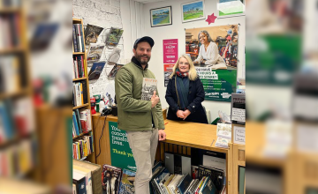 Actor Jamie Dornan visits Concern's bookshop in Holywood, Co Down, with Retail Manager Aileen McKee. 