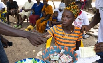 A meeting of the Majehun Village Savings and Loans Association in Tonkolili, Sierra Leone. (Photo: Kieran McConville/Concern Worldwide)