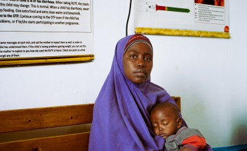 Amburo* (28) with her youngest child visits MCH (Maternal & Child Health Centre) in Daynile District, Mogadishu. Photo: Adnan Mohamed/Concern Worldwide